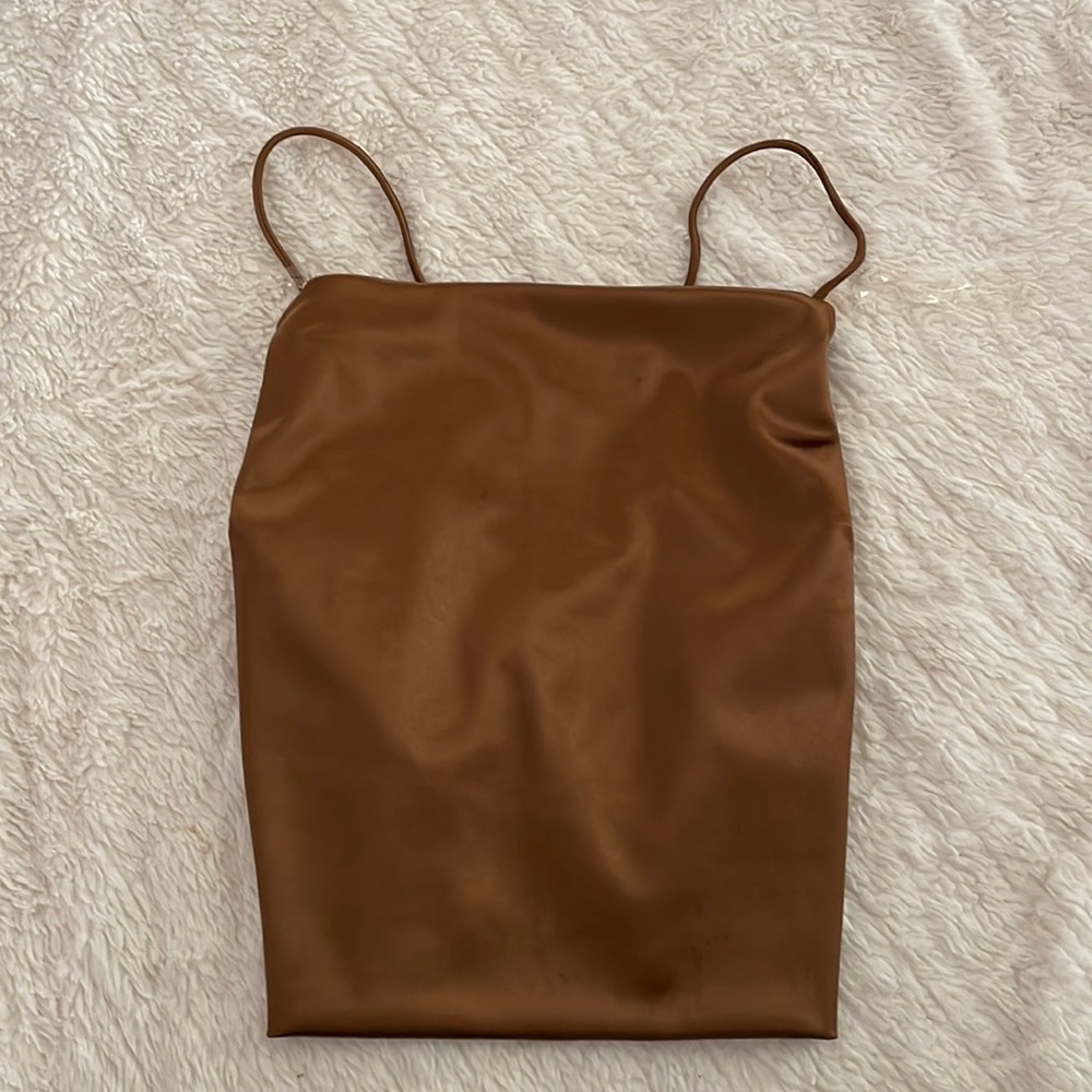 Brown tank with open back